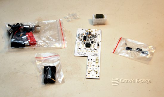 
    Contents of the kit, PCB almost completely assembled.
    