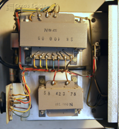 
    View of the inside on the left, power transformer and choke.
    