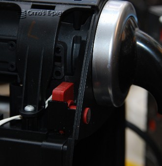 
    The on/off push button after repair.