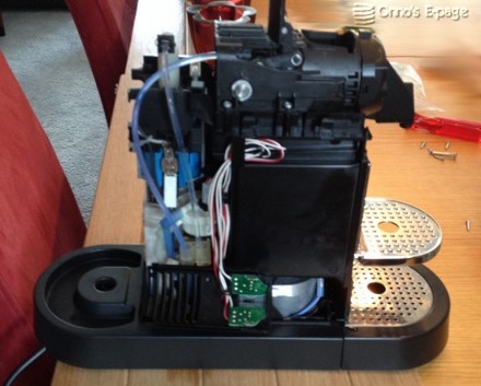 
    XN7001 with its covers taken off.
    Control panel with 2 buttons dangling on the side.